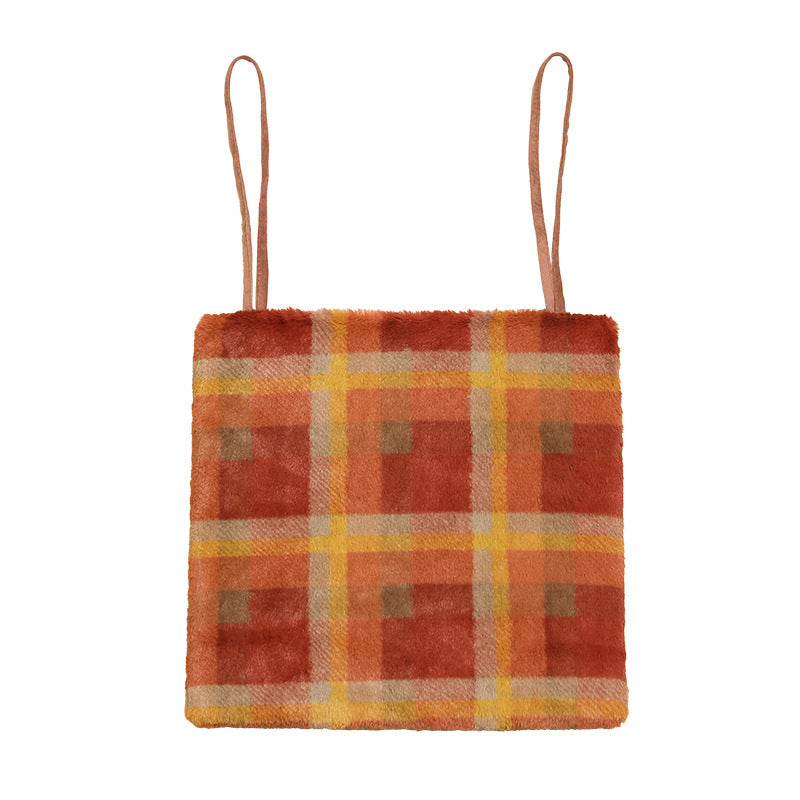 Padded chair cushion with checked plush cover and fastening ties