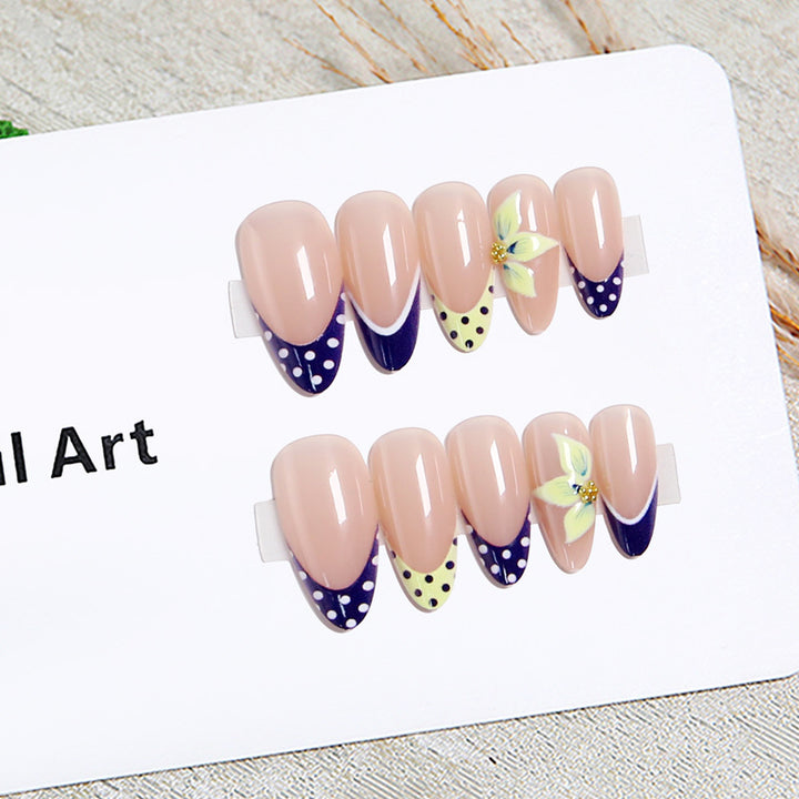 Artful nail tips with floral accent Kalsten