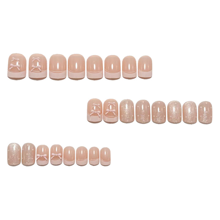 Artificial nails with delicate bows and glitter accents Kalsten