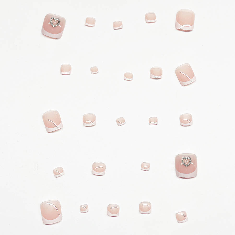 Acrylic nail set with playful heart design Kalsten