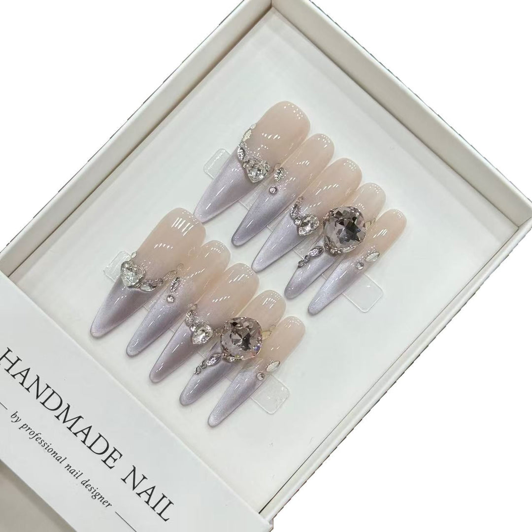 Artistic Stiletto Press-On Nails with Elegant Gem Accents