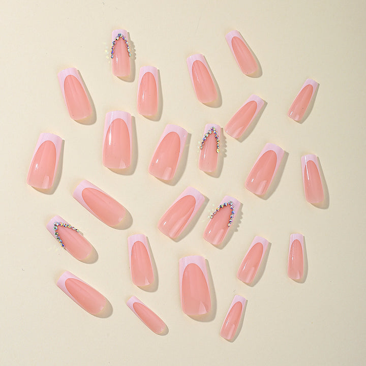 Elegant French Tip Acrylic Nail Extensions with Rhinestone Accents Kalsten