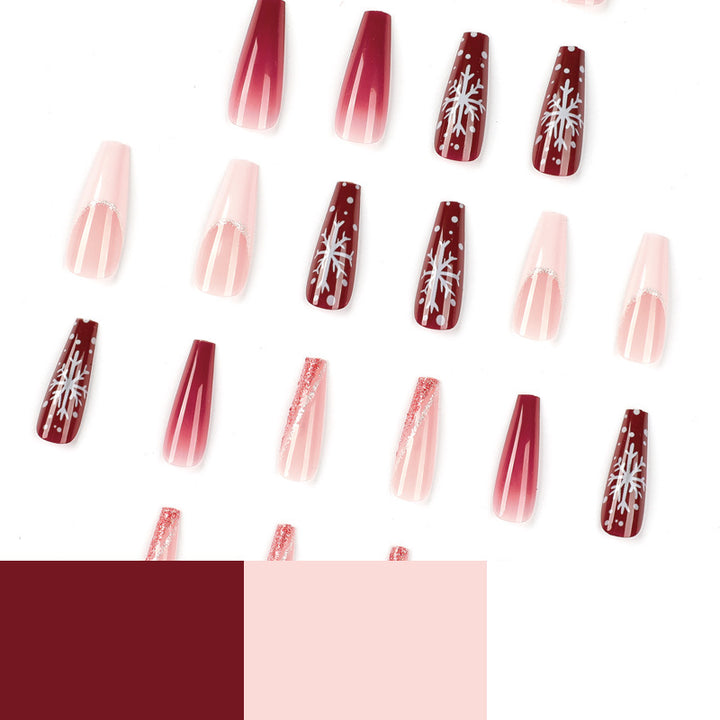 Artful Christmas nail extensions with elegant glitter and snowflake design Kalsten
