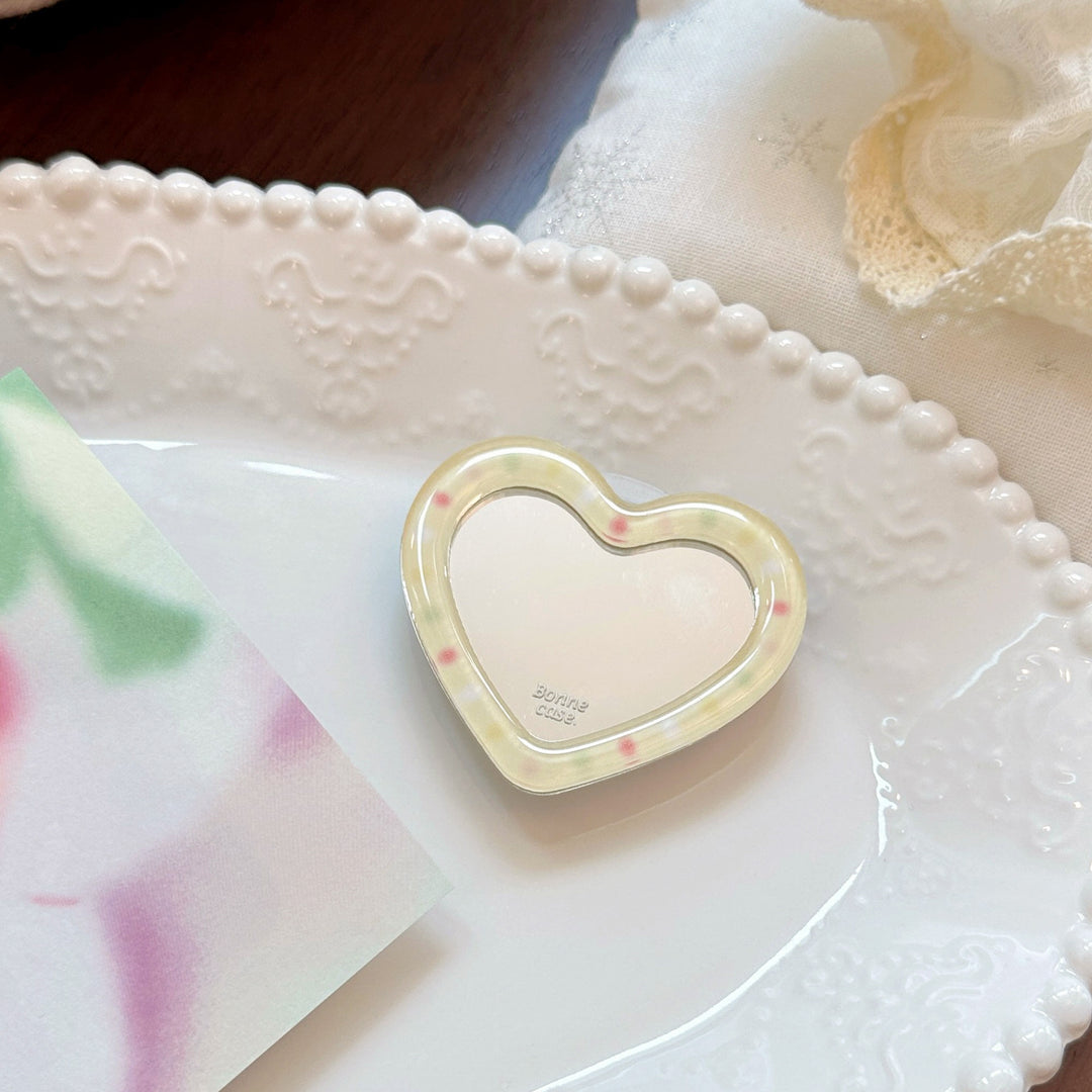 Hand mirror in heart-shaped design Kalsten