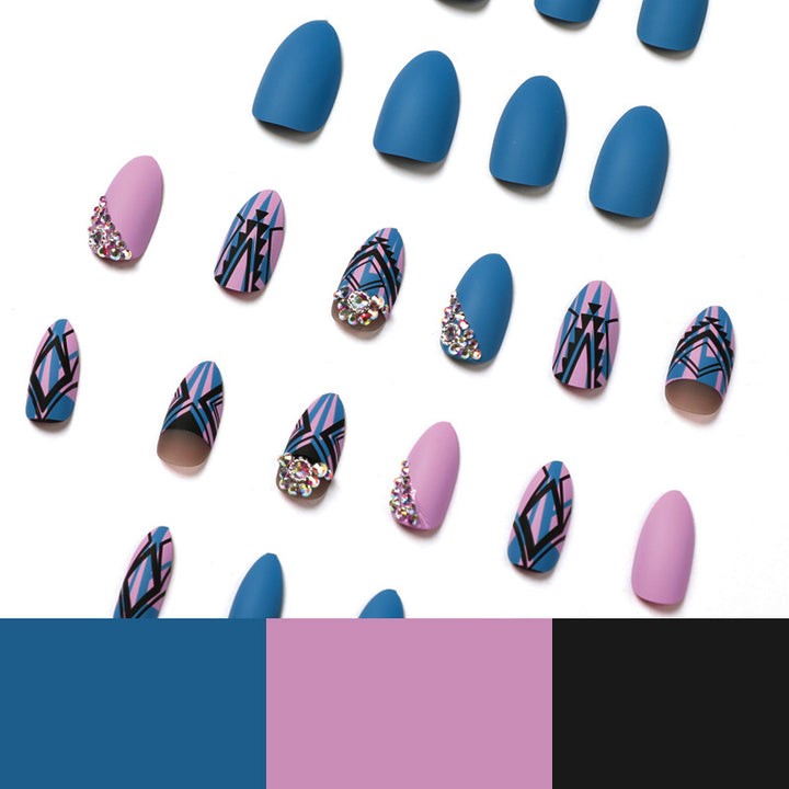 Artful stiletto nails with modern geometric designs and rhinestone embellishments Kalsten