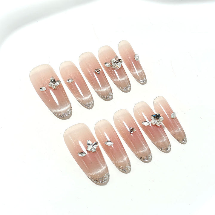Glamorous artificial nails with glitter decorations Kalsten