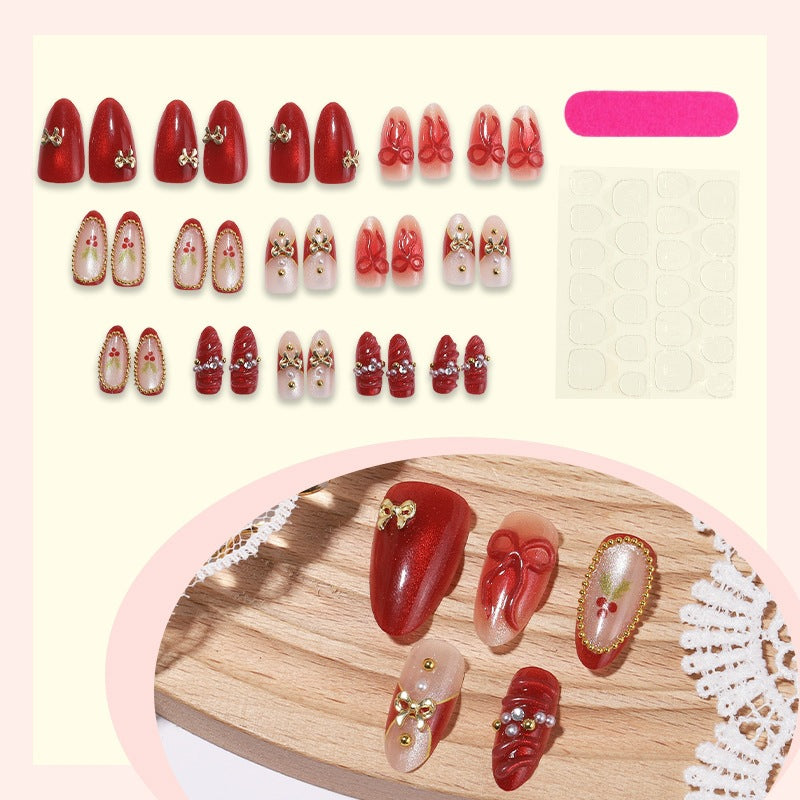 Artificial nail set with glamorous decorations and festive accents Kalsten