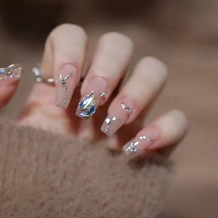 Glamorous artificial nails with glitter accents Kalsten