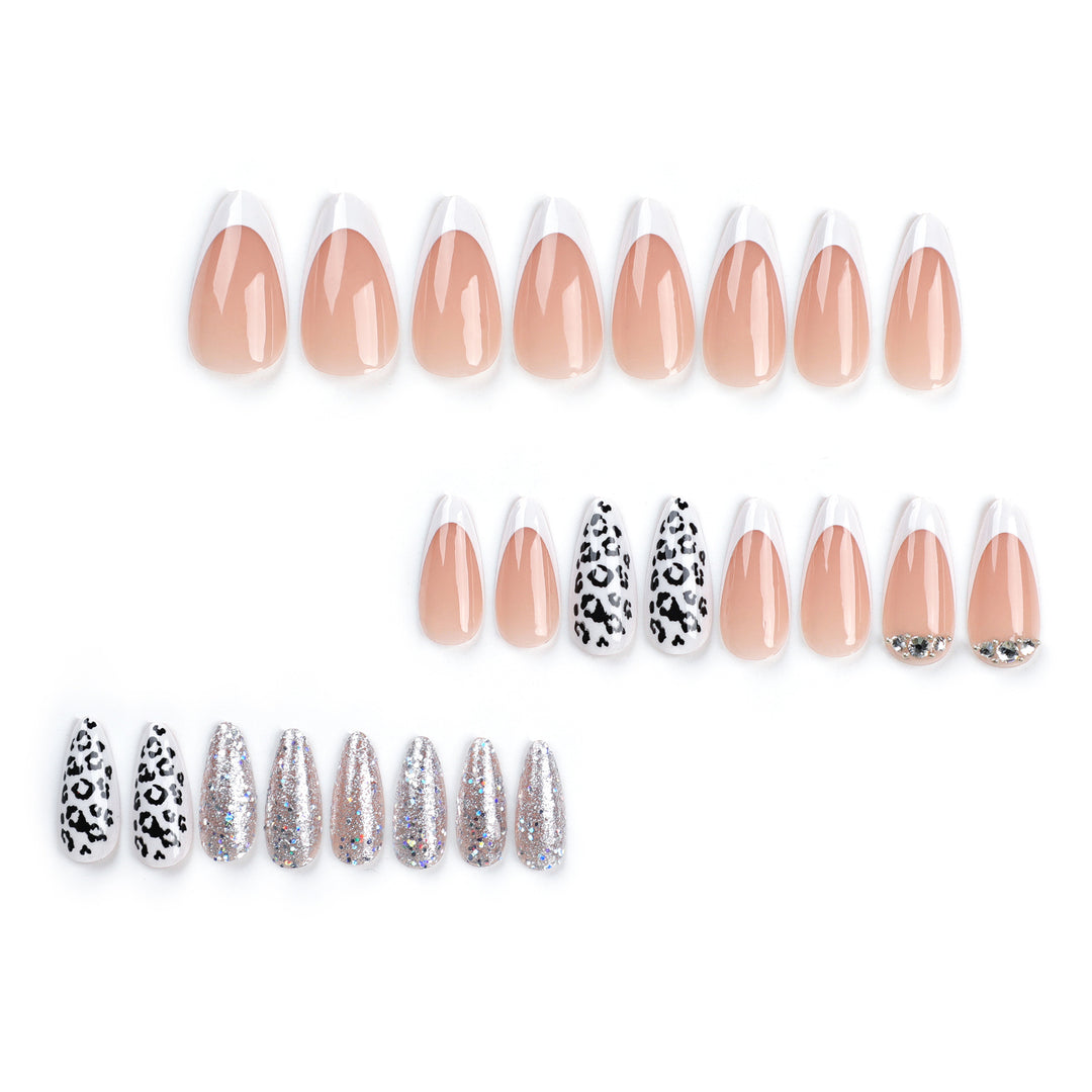 Artful stiletto nails with leopard patterns and glitter accents Kalsten