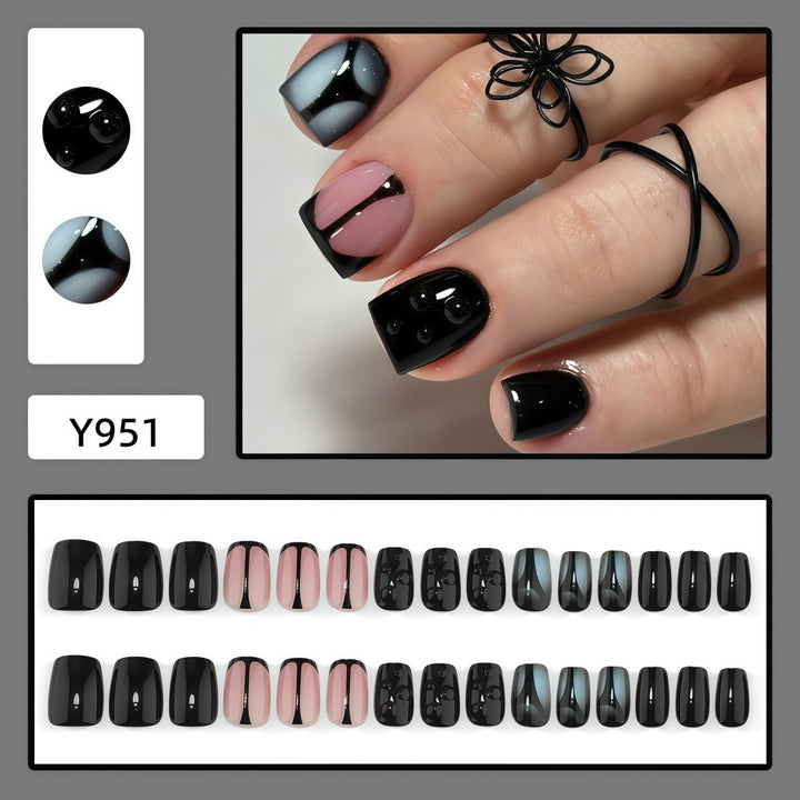 Artificial nails with elegant black and pastel accent design Kalsten