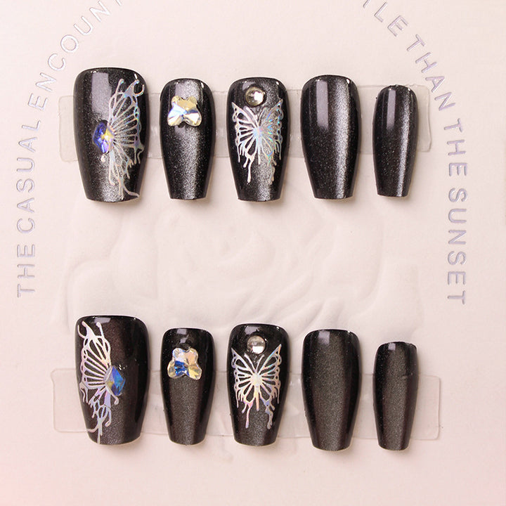 Artificial nails with decorative butterfly designs and glitter accents Kalsten