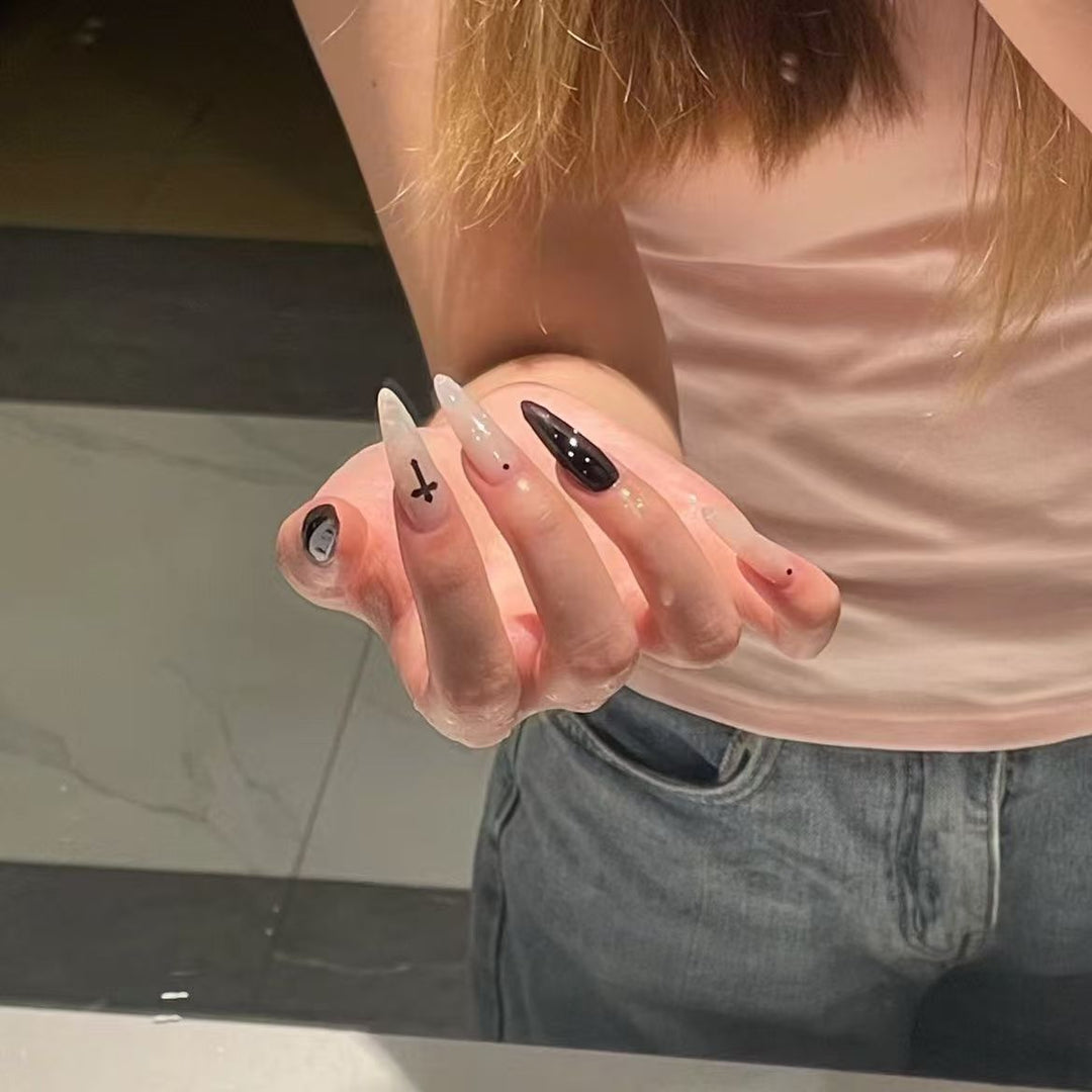 Gothic-Inspired Long Almond Nail Art Kalsten
