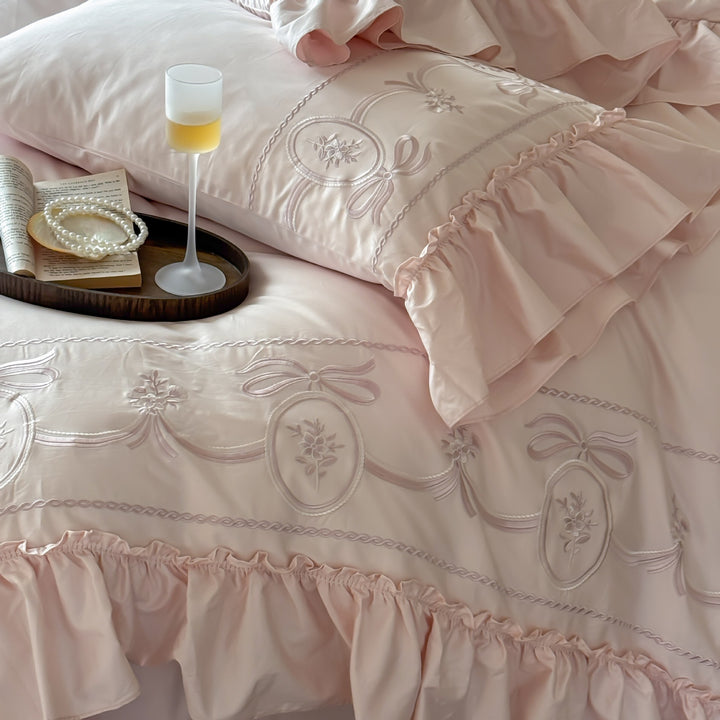 Luxurious embroidered bedding set with ruffle and pillowcases
