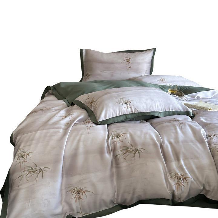 Luxurious satin bedding set with subtle bamboo print and contrasting decorative piping