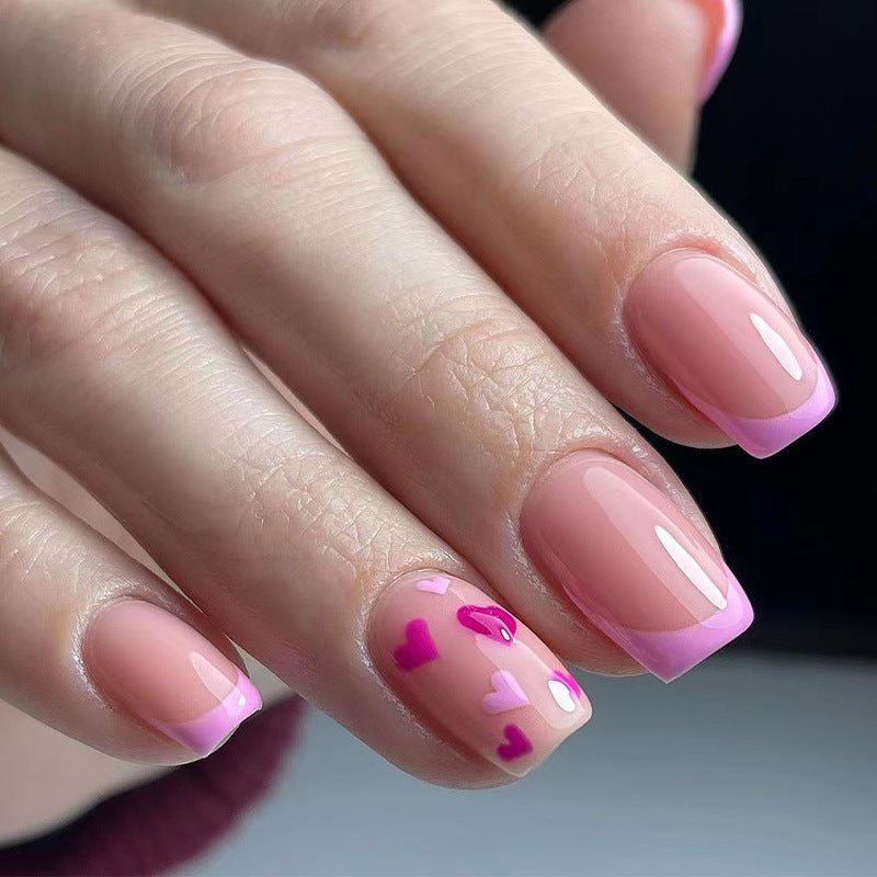 Elegant Nail Art with Heart Motifs Kalsten