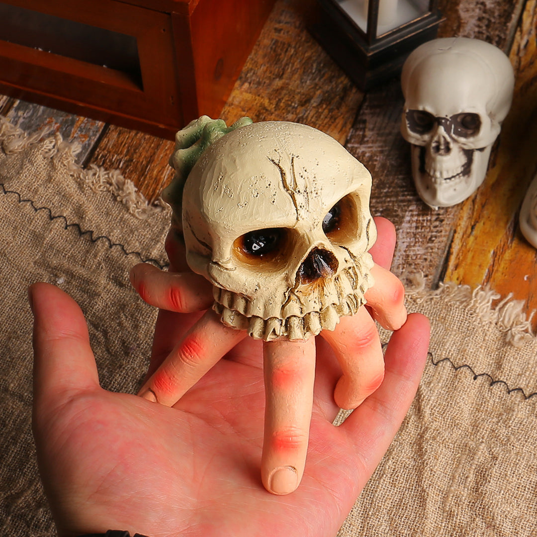 Detailed Halloween decoration sculpture skull with grasping hand