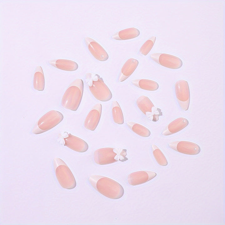 Acrylic nail set with elegant tips and floral accents Kalsten