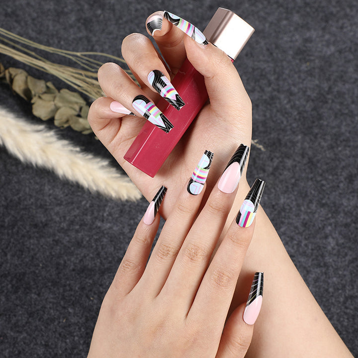 Creative artificial nails with modern graphic designs Kalsten