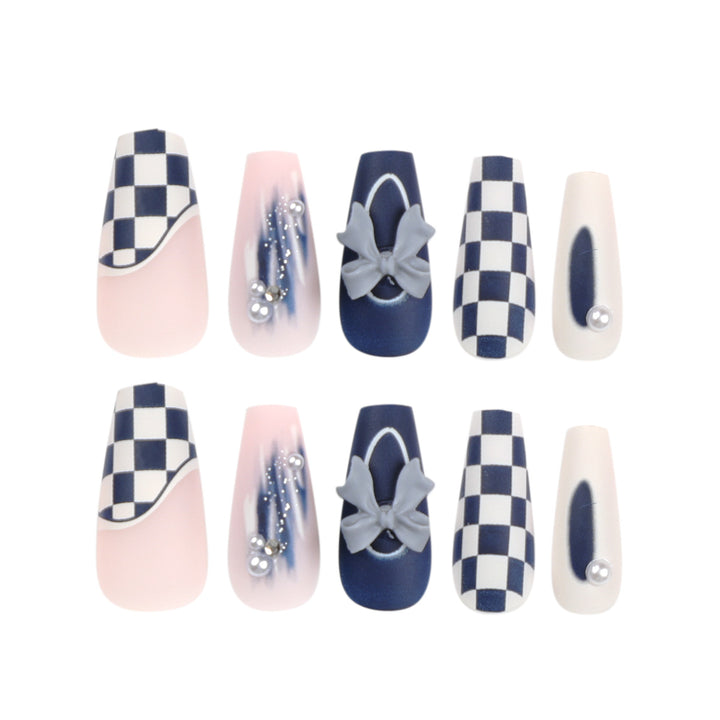 Artful nail decoration with bows and plaid pattern Kalsten