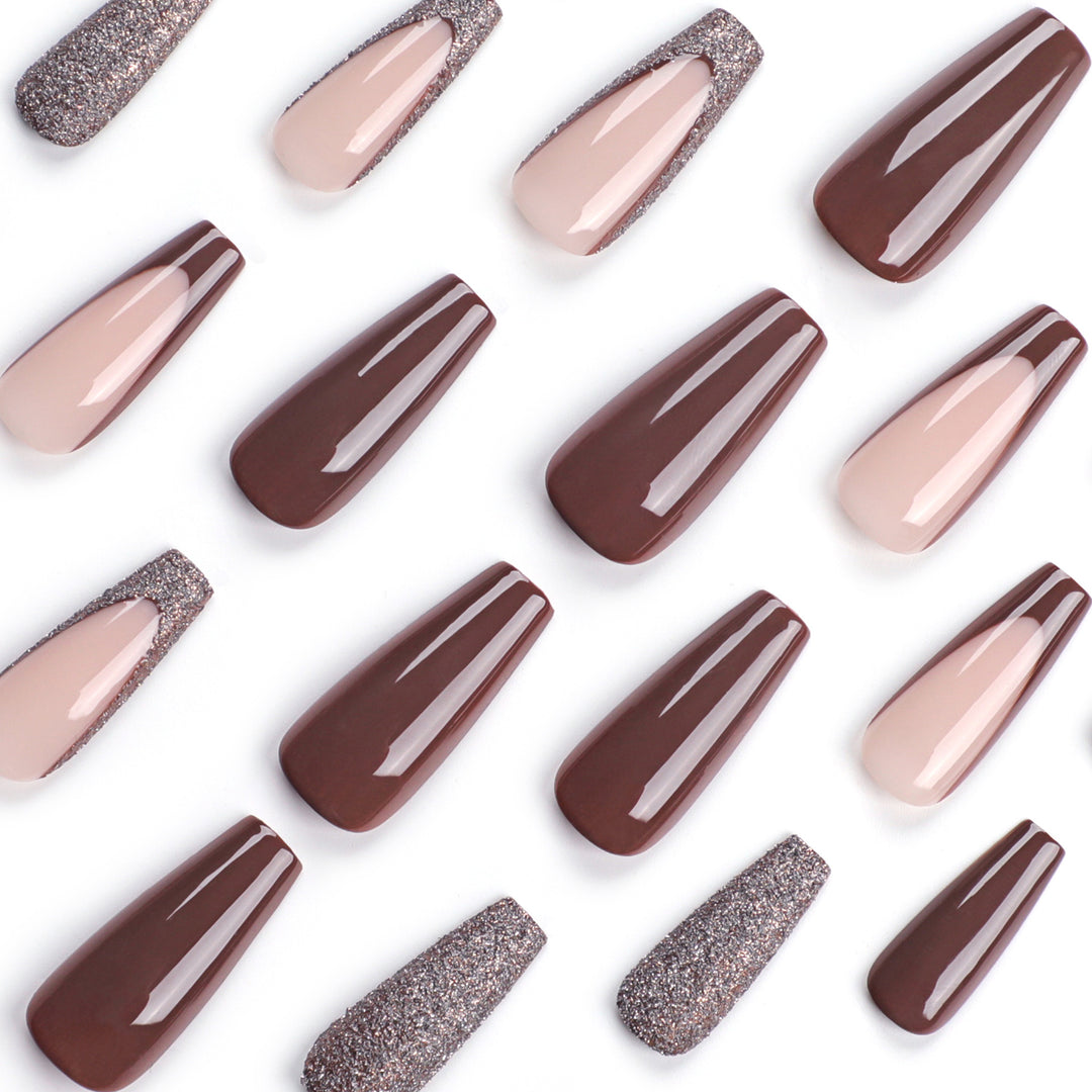 Artful stiletto nails with glitter embellishments Kalsten