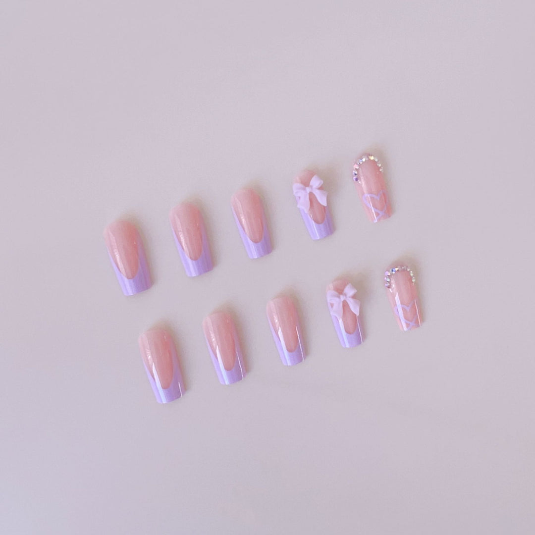 Artificial nail set with elegant 3D bows and glitter details Kalsten