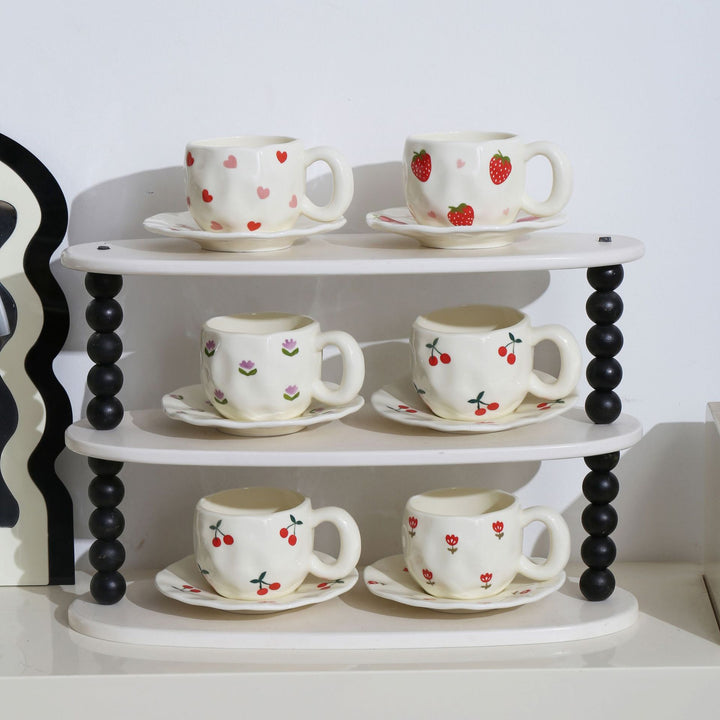 Ceramic mug with hand-painted tulip pattern and organic shape
