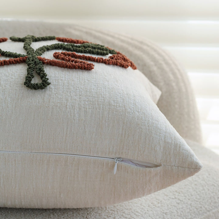 Square decorative pillow cover with hand-tufted leaf motif and fine linen texture Kalsten