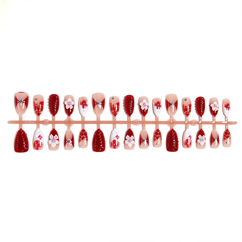 Luxury designed artificial nails with flower accents Kalsten