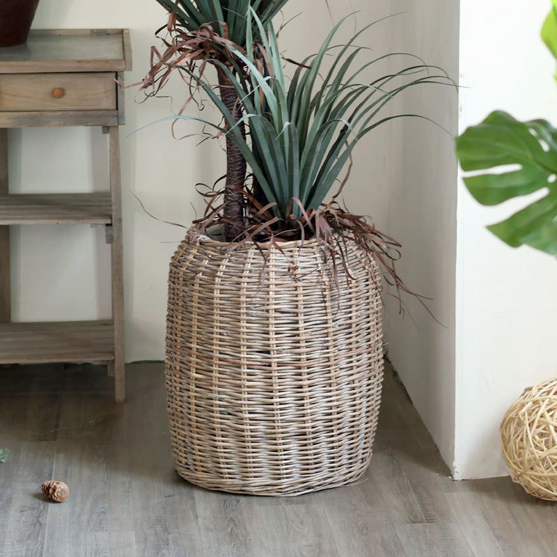 Stylish laundry basket made of braided natural material Kalsten