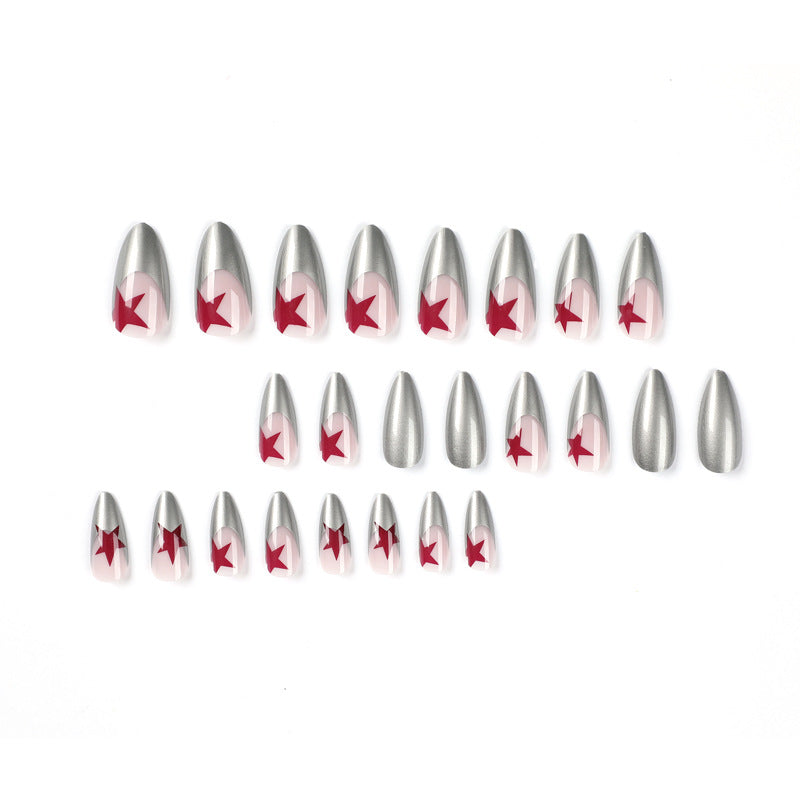 Artful stiletto nails with silver and star motifs Kalsten