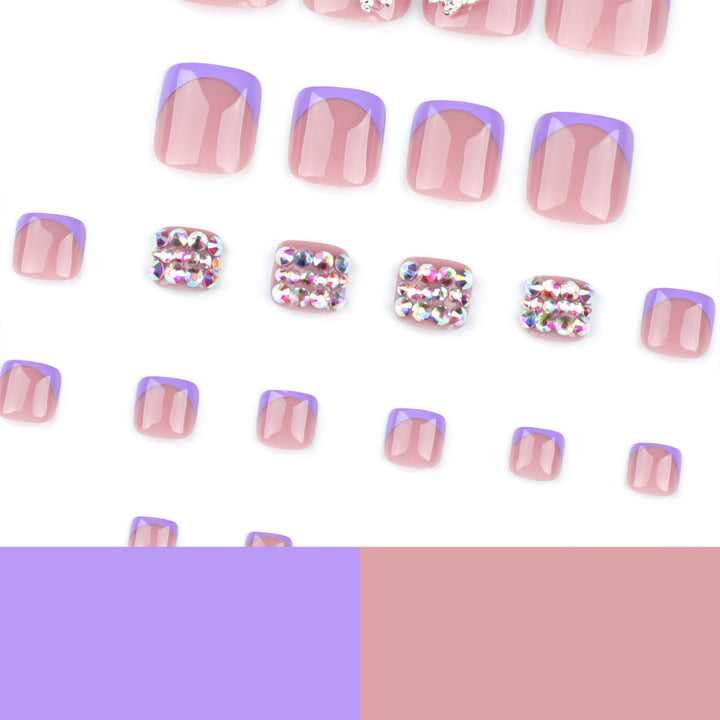 Artful toenail art with elegant glitter decorations Kalsten