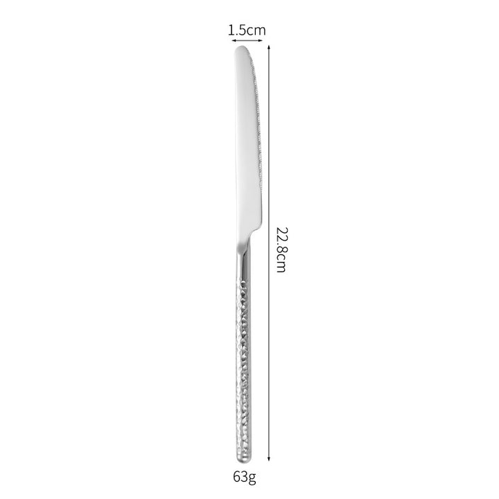 Elegant dessert spoon with elaborate handle design Kalsten
