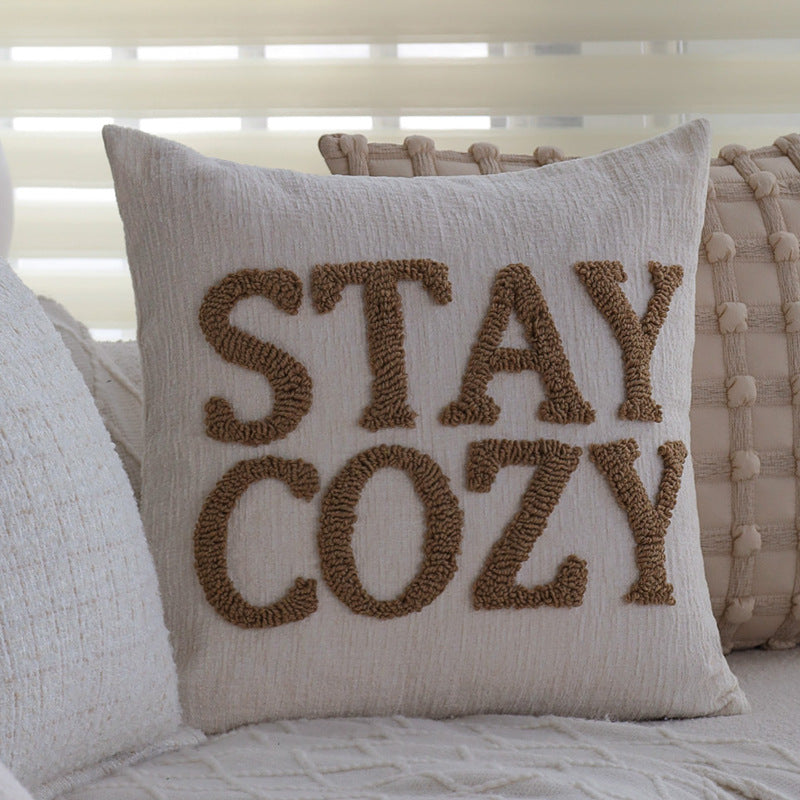 Square decorative cushion cover made of mottled bouclé weave with subtle piping Kalsten