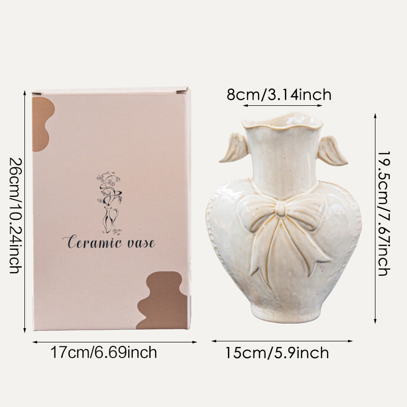Decorative Heart-Shaped Ceramic Vase with Sculpted Bow and Wavy Neck