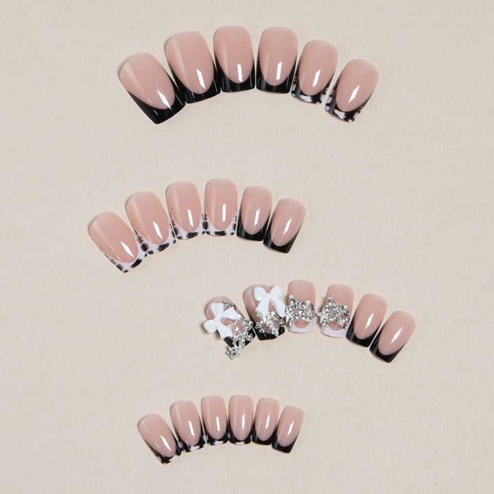 Elegant artificial nails with detailed embellishments Kalsten