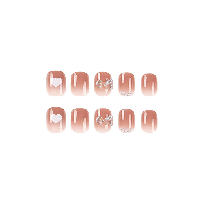 Artificial nails with romantic hearts and glitter accents Kalsten