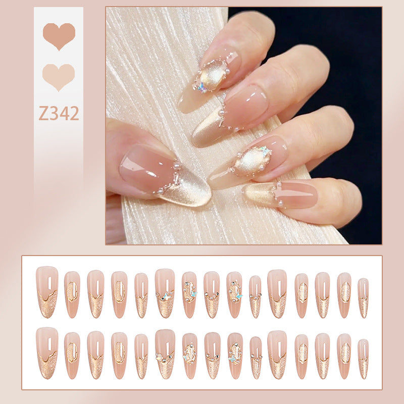 Art nail set with elegant gold glitter design Kalsten