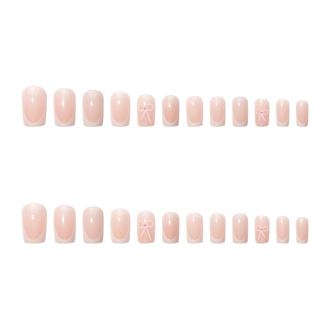 Nail art set with elegant bow and glitter accents Kalsten