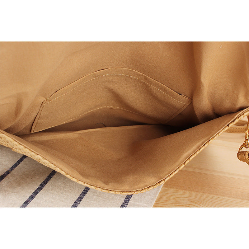 Shoulder bag made of braided natural material with original wave pattern Kalsten