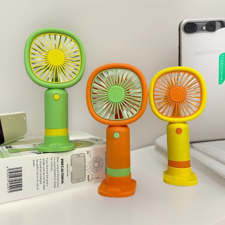 Unisex Handheld Fan with ergonomic design and practical stand function Kalsten