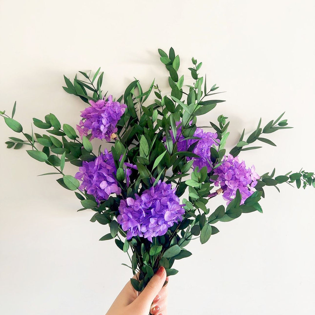 Lifelike Floral Bouquet with Green Foliage