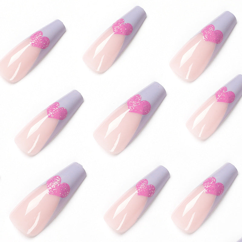 Artful stiletto nails with colorful heart designs Kalsten