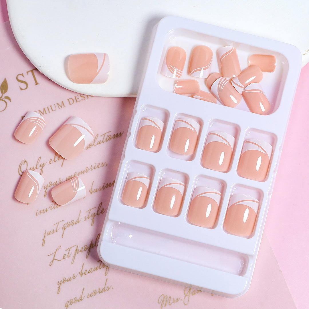 Artificial nail set with elegant French nail design and modern lines Kalsten