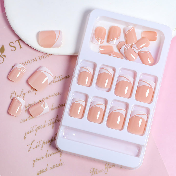 Artificial nail set with elegant French nail design and modern lines Kalsten