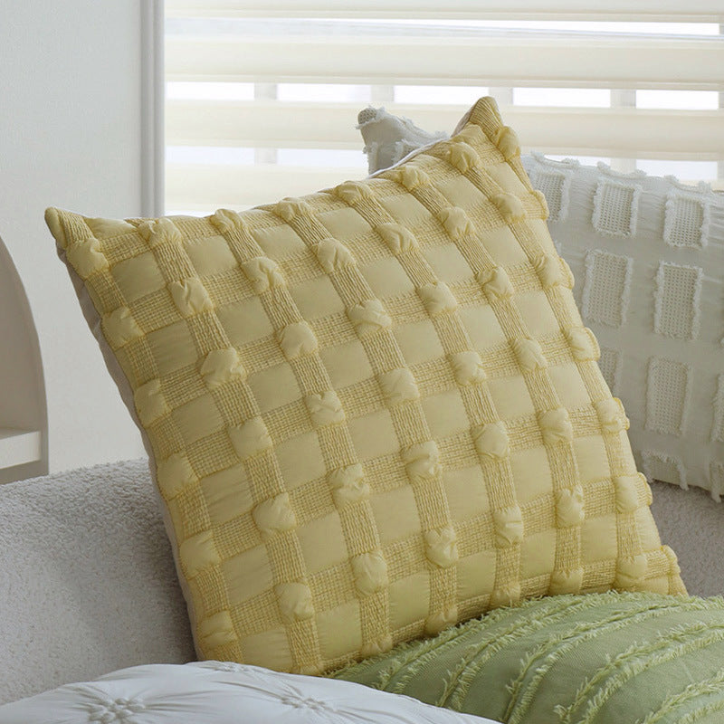 Square decorative pillow cover made of cotton blend with relief rectangular tufts and fringed edge Kalsten
