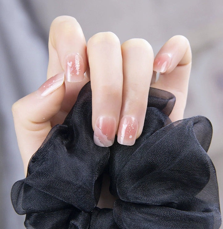 Elegant nail design with pearl embellishment Kalsten