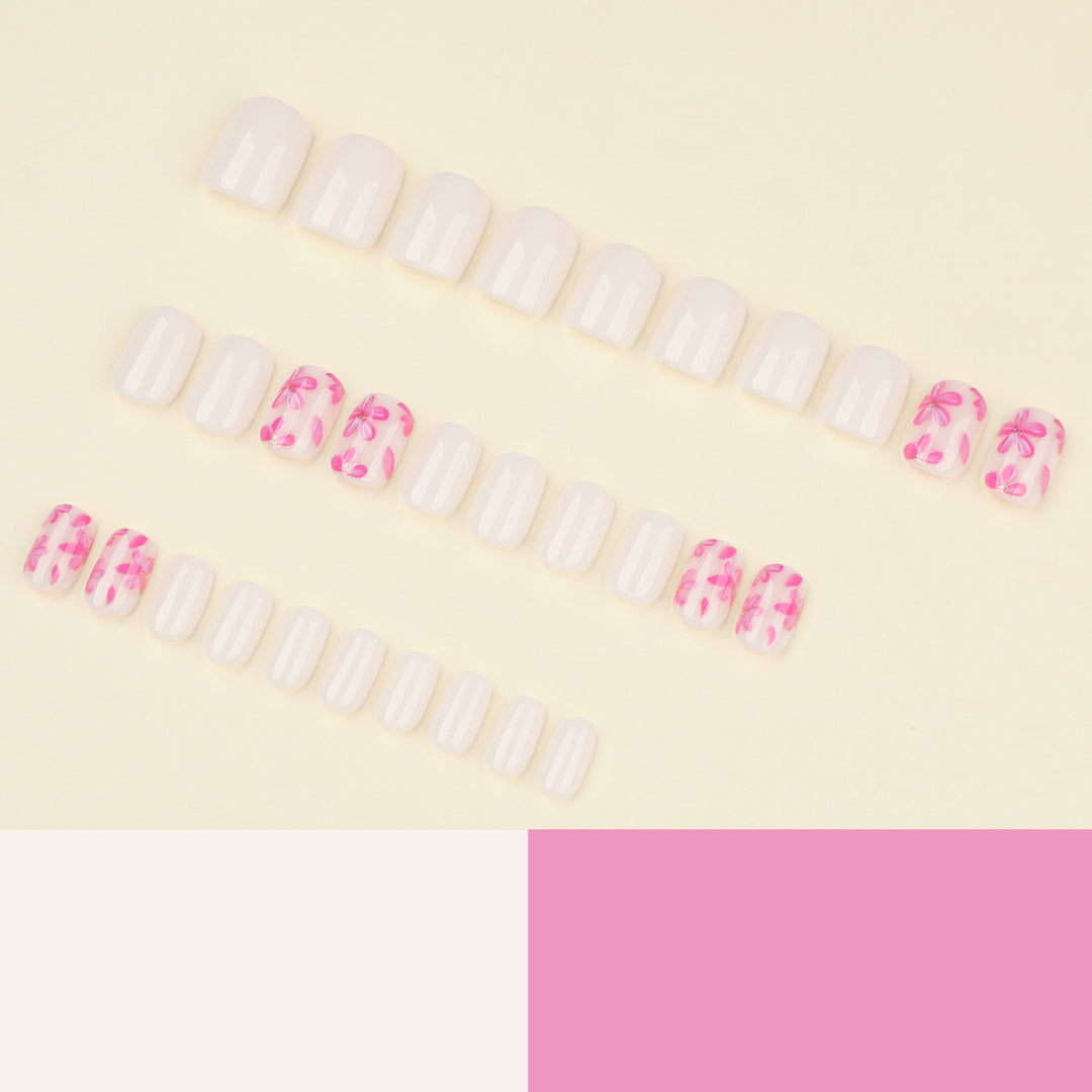 Stylish artificial nail design with floral accents Kalsten