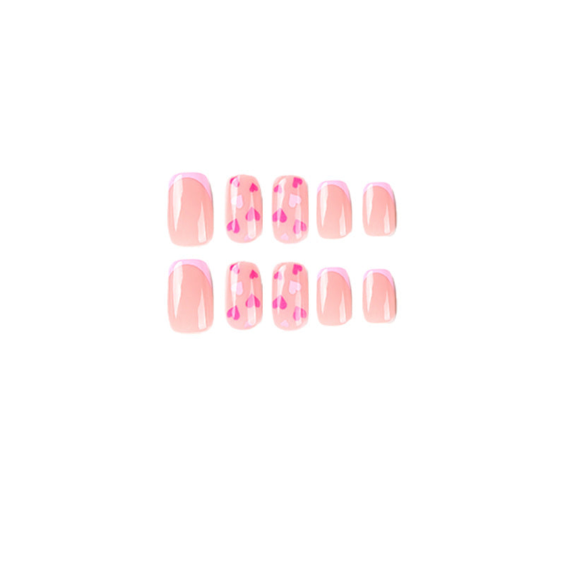 Elegant Nail Art with Heart Motifs Kalsten