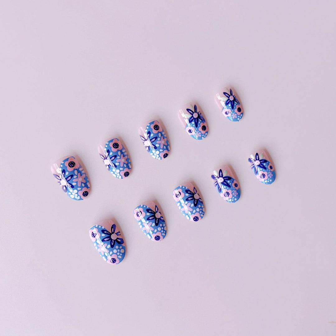 Nail art set with floral accents and vibrant patterns Kalsten