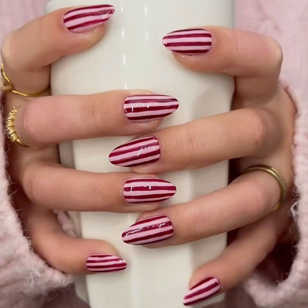 Artistic nail art with striped design Kalsten